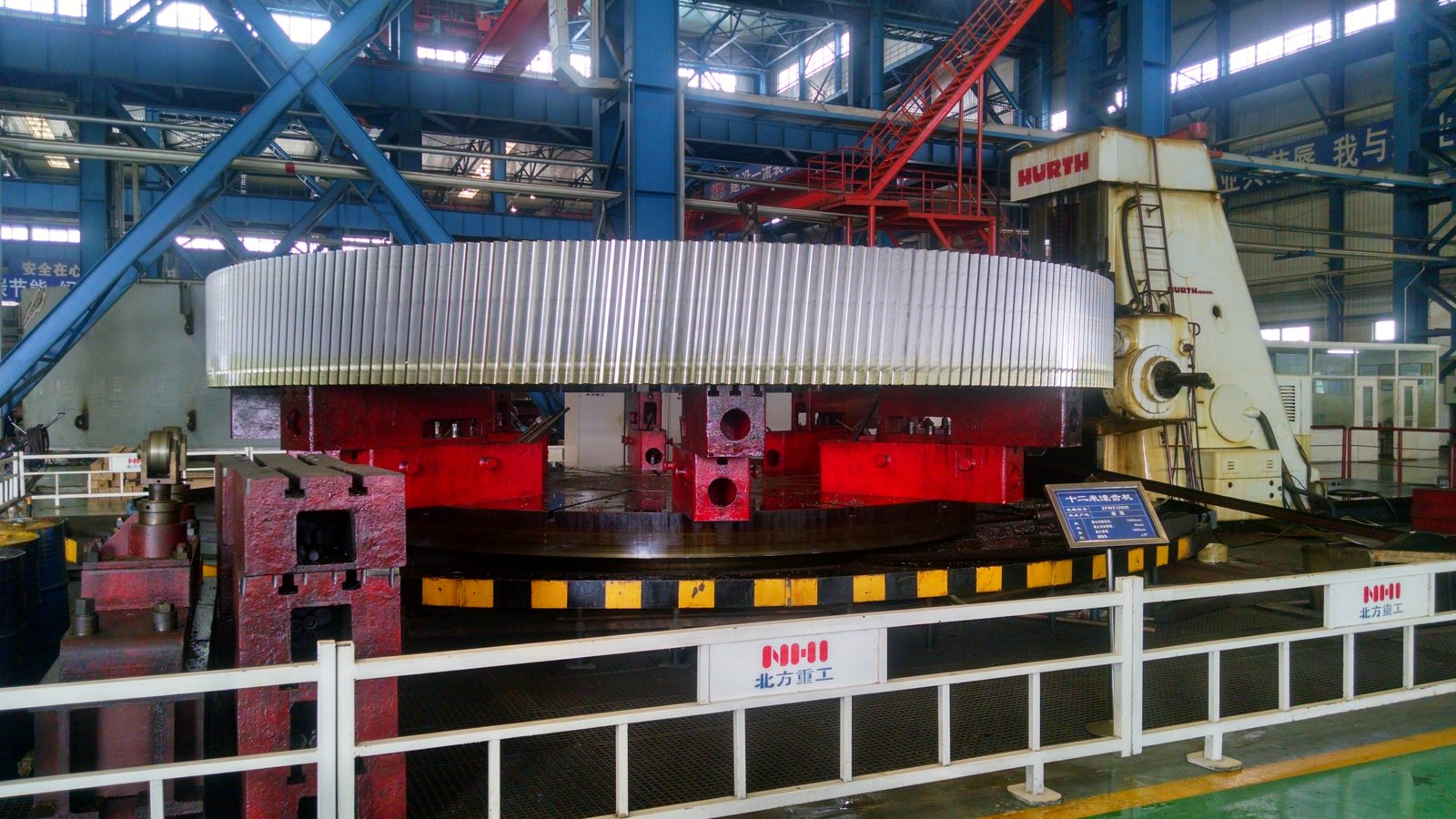 Large grinding ball mill for ore comminution in a mineral processing plant
