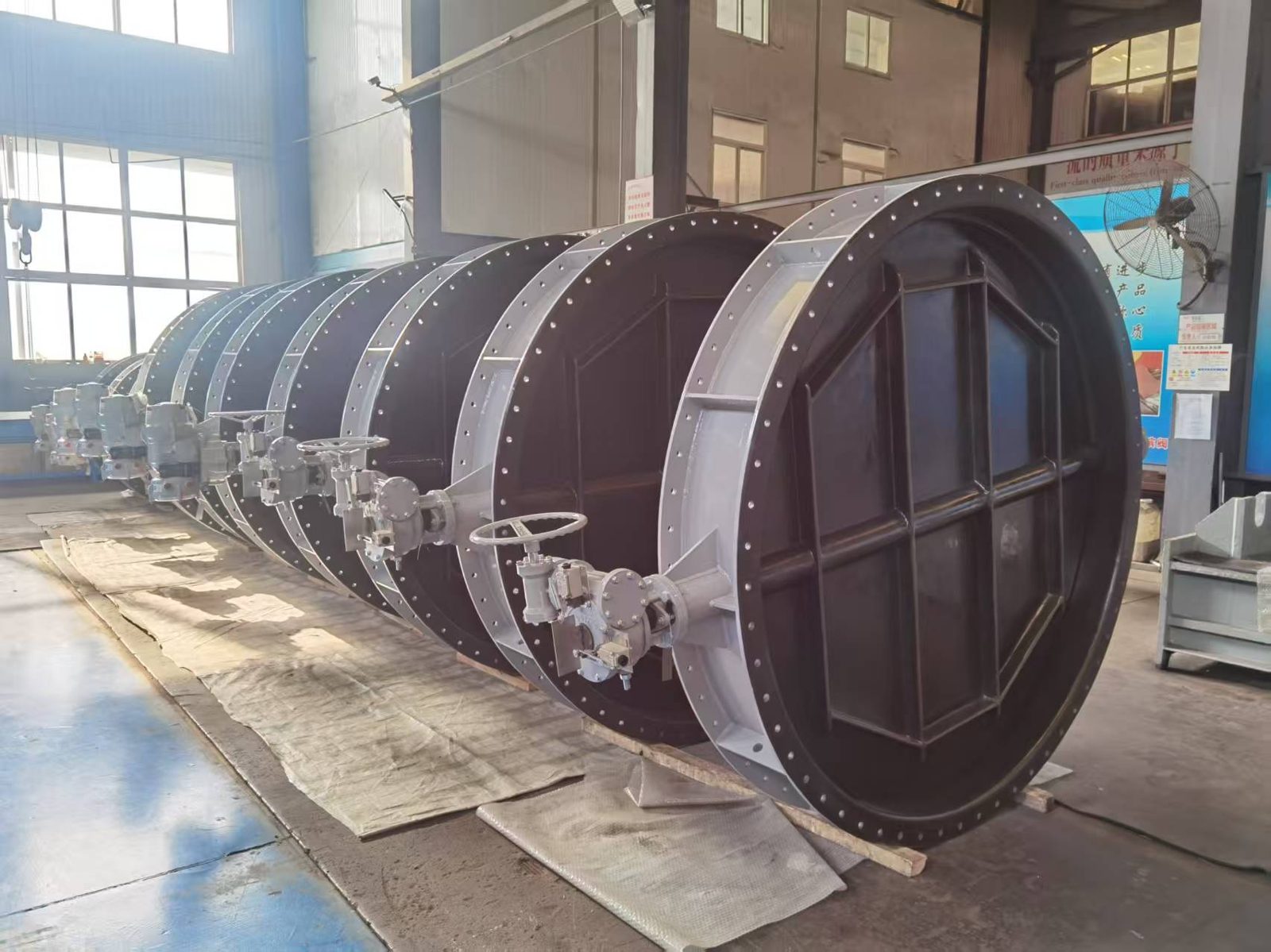 Large-diameter FRP-lined butterfly dampers for corrosive flue-gas service
