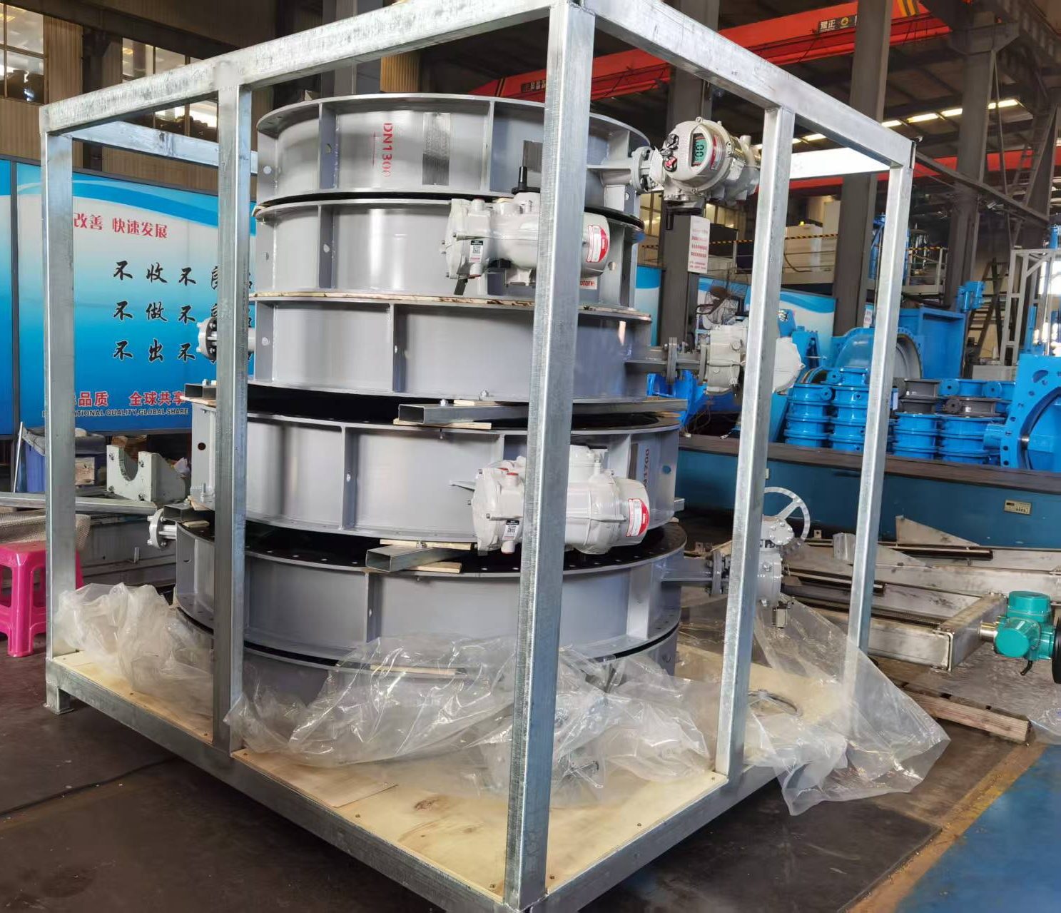 Large-diameter FRP-lined butterfly damper with electric actuator and positioner, crated in a galvanized steel frame for ocean export
