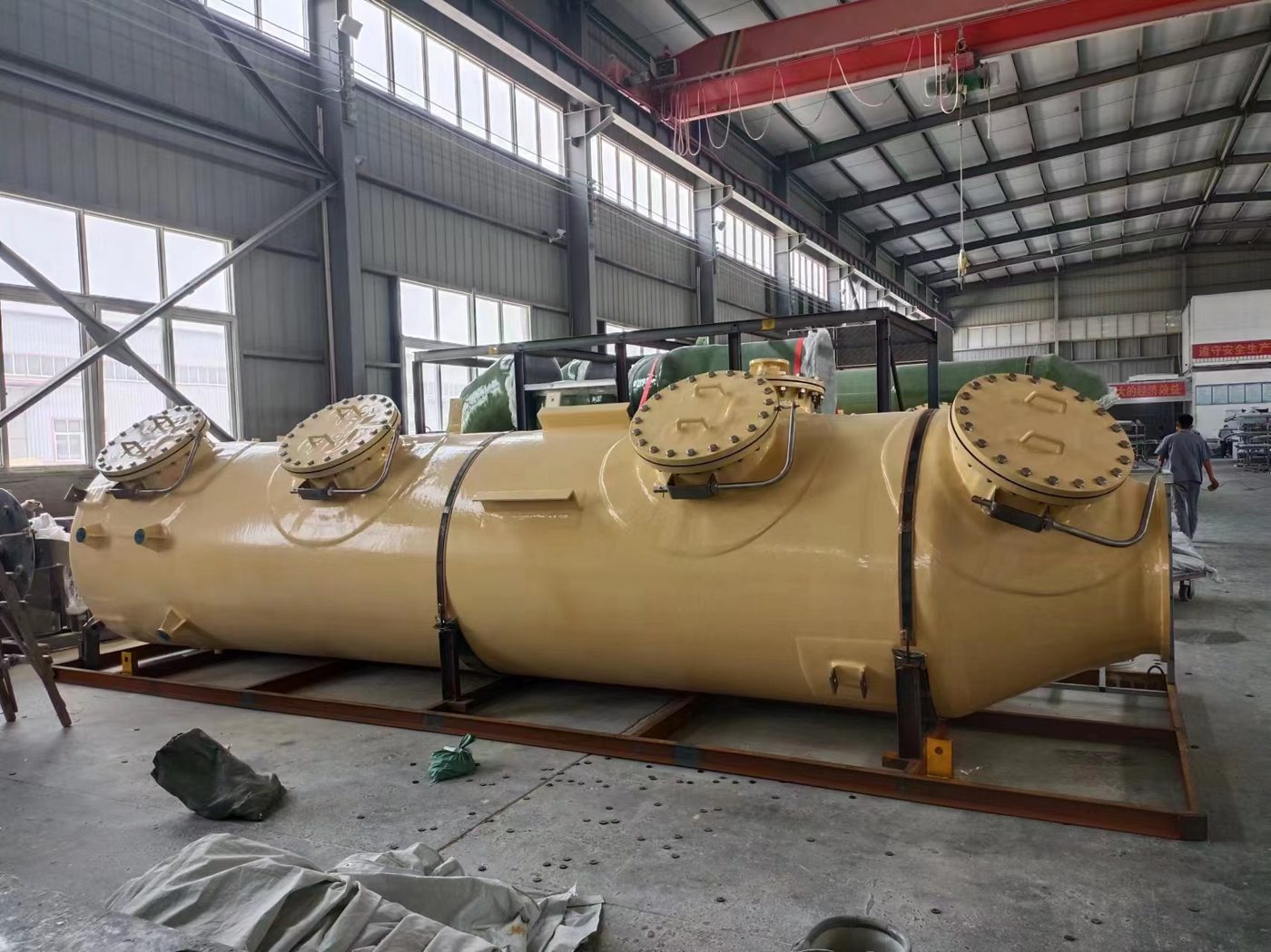 Large horizontal FRP scrubber vessel with flanged nozzles and manways