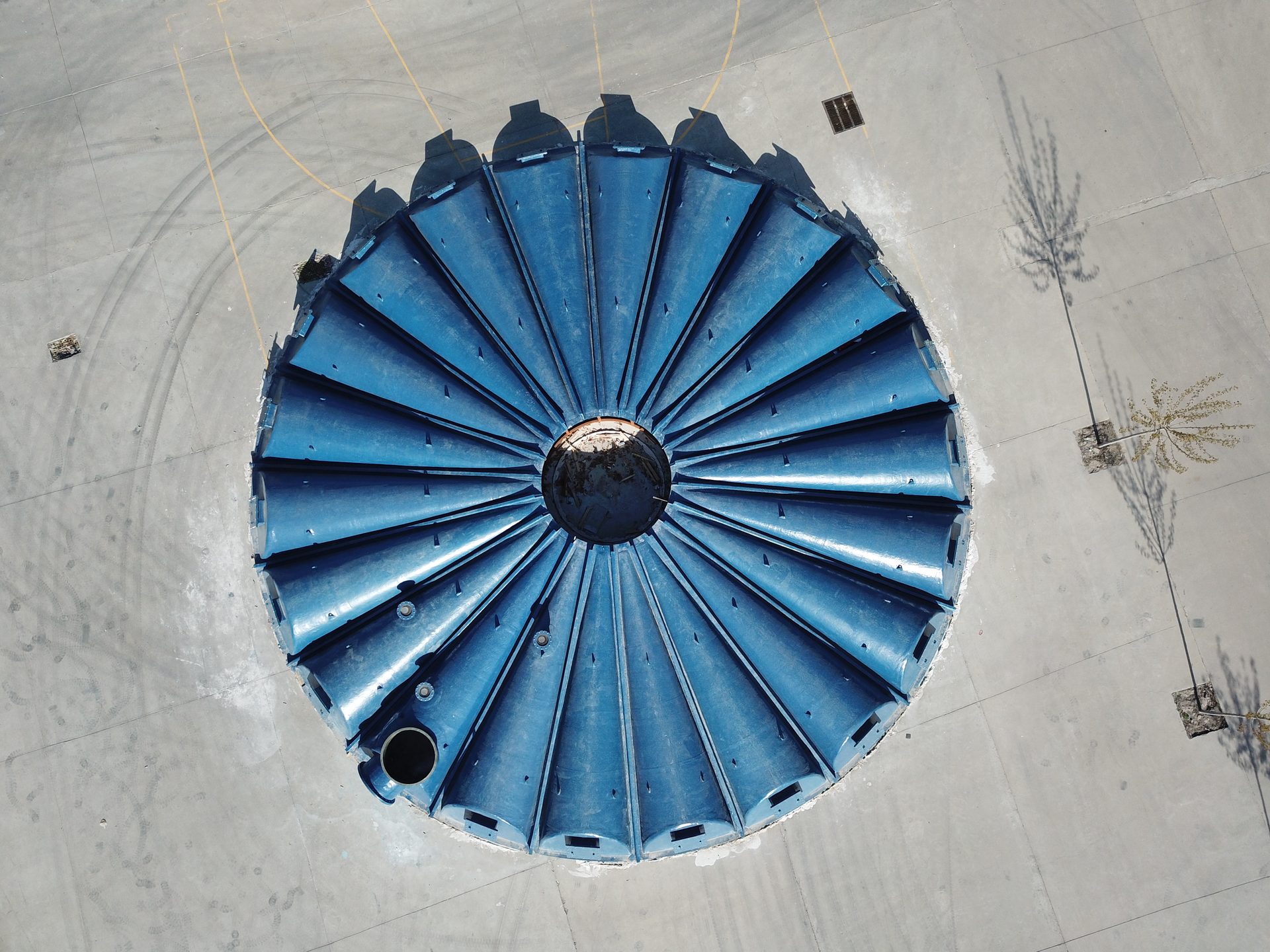 Aerial view of a large-diameter FRP thickener cover fabricated by Crimar Industrial